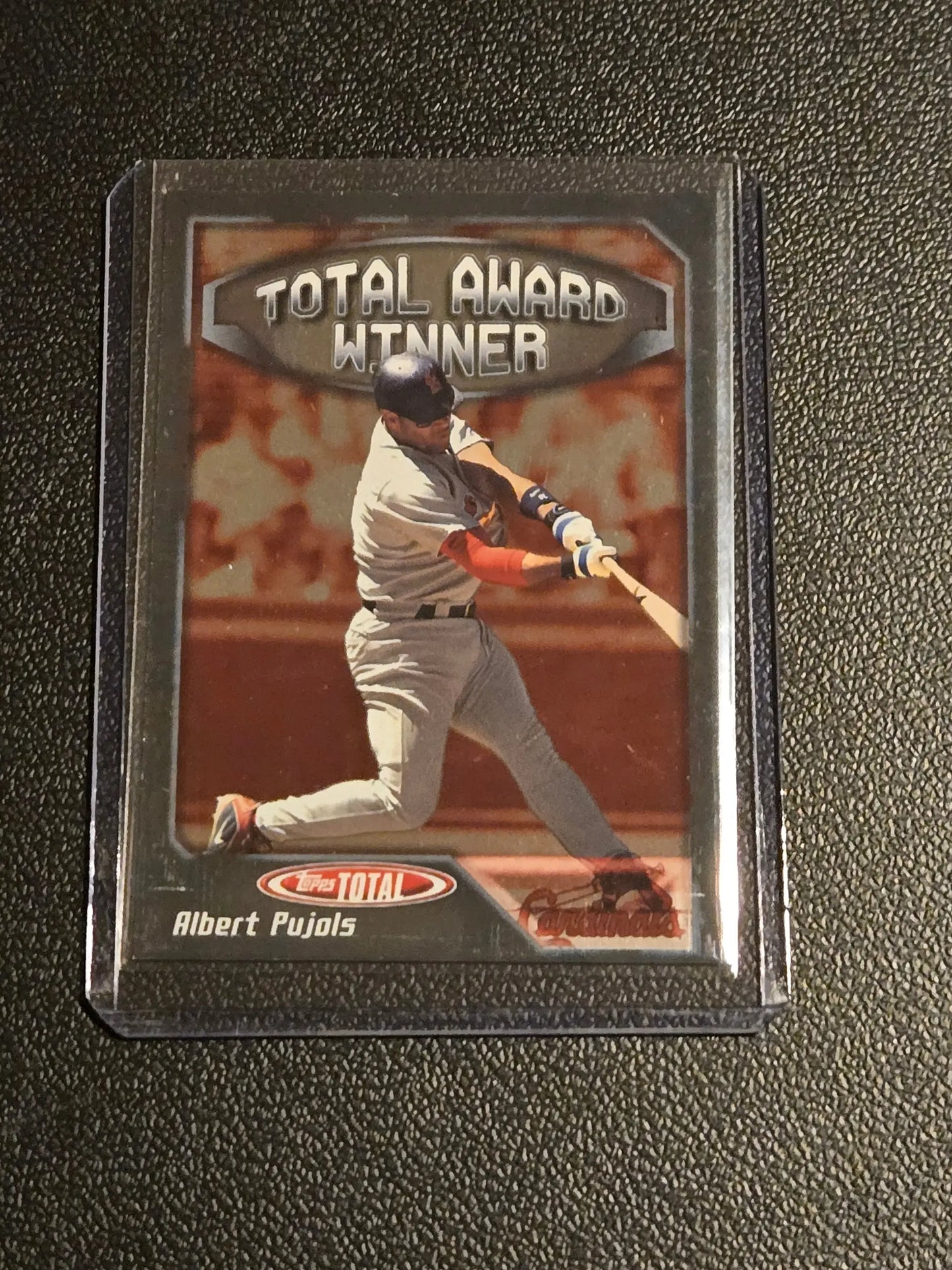 Albert Pujols baseball card in protective case from 2004 Topps Total #AW4 Albert Pujols Total Award Winners