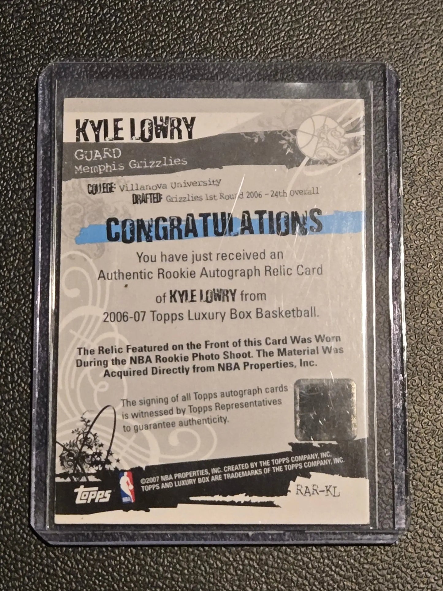 Kyle Lowry rookie autograph relic card in protective case from 2006-07 Topps Luxury Box