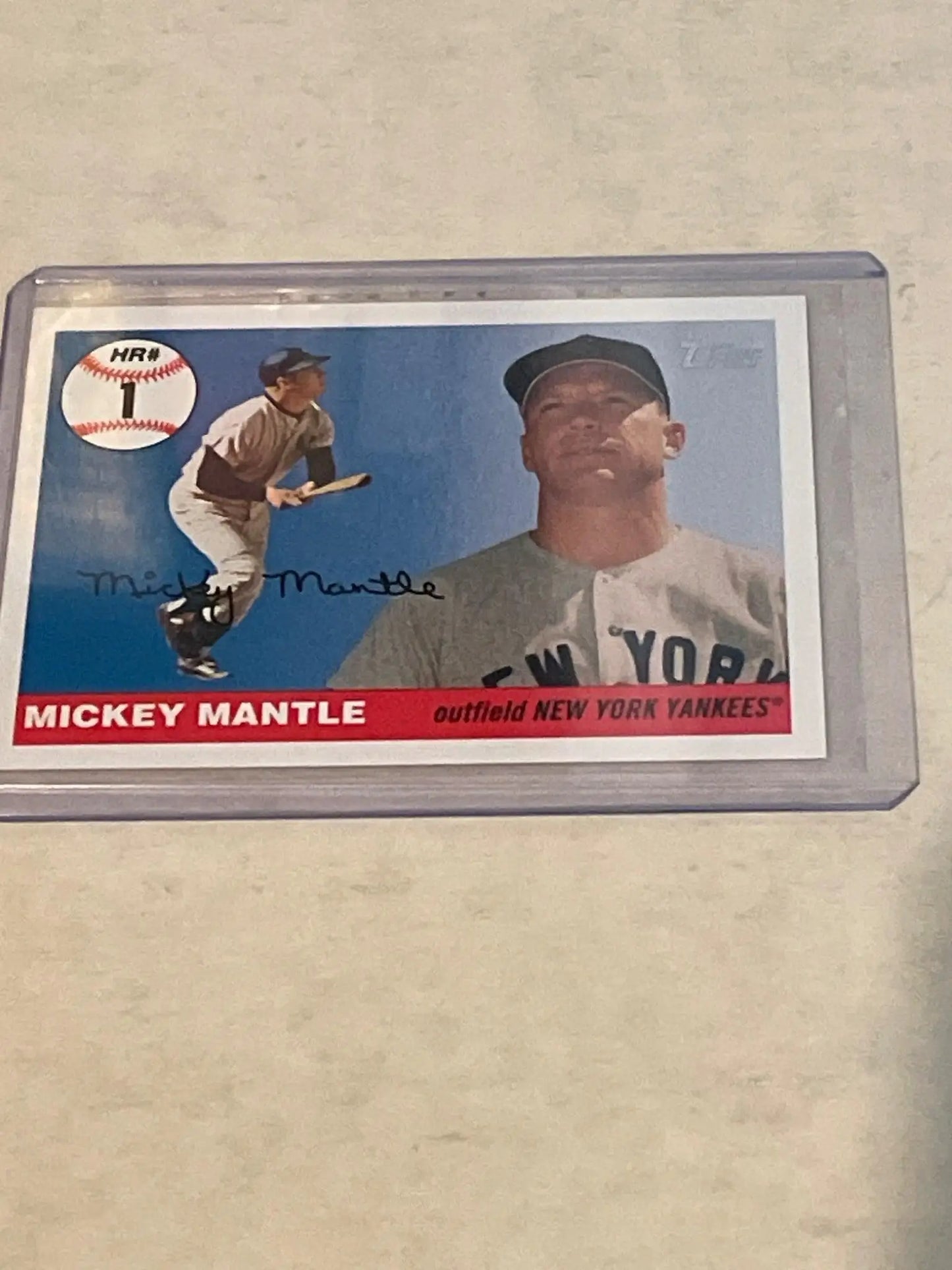 Baseball card of New York Yankees player in dual-pose design from Topps collection