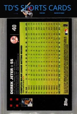 Derek Jeter baseball card from 2007 Topps #40 with Mantle and Bush in trading card collection