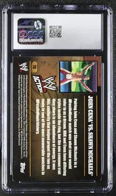 Graded Topps WWE Action wrestling card featuring John Cena vs Shawn Michaels CGC 9