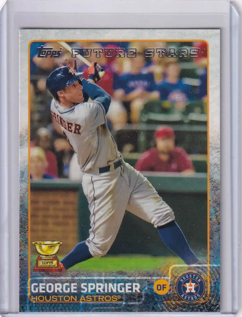 Baseball card of George Springer Houston Astros player mid-swing from 2015 Topps