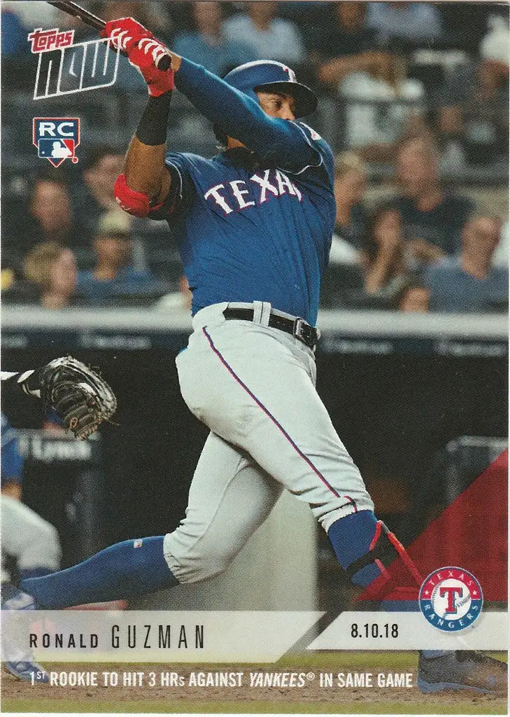 Baseball player Ronald Guzman in Texas Rangers uniform swinging bat, 1st rookie achievement