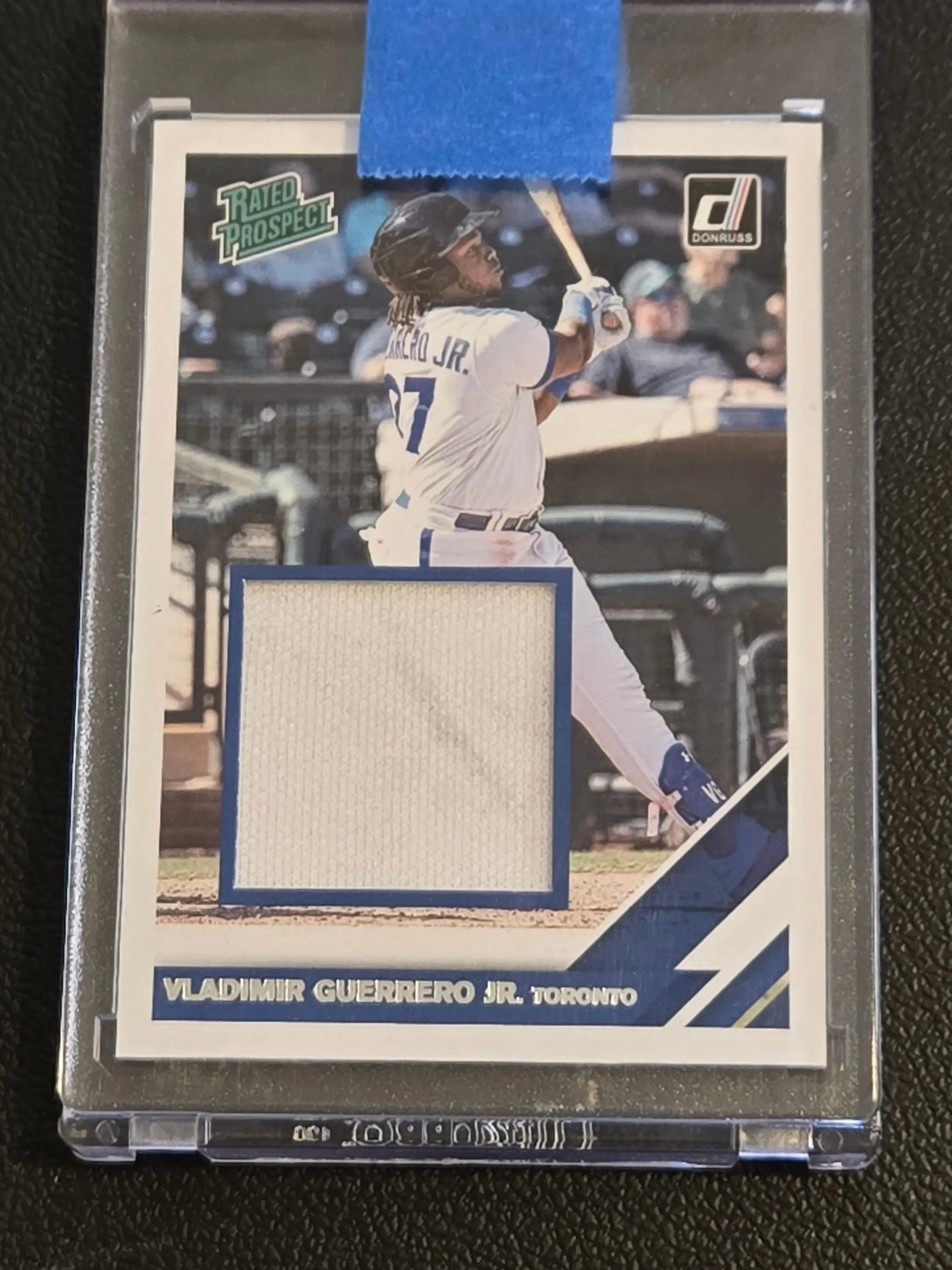 Baseball trading card featuring Vladimir Guerrero Jr. rated prospect material with game-used jersey