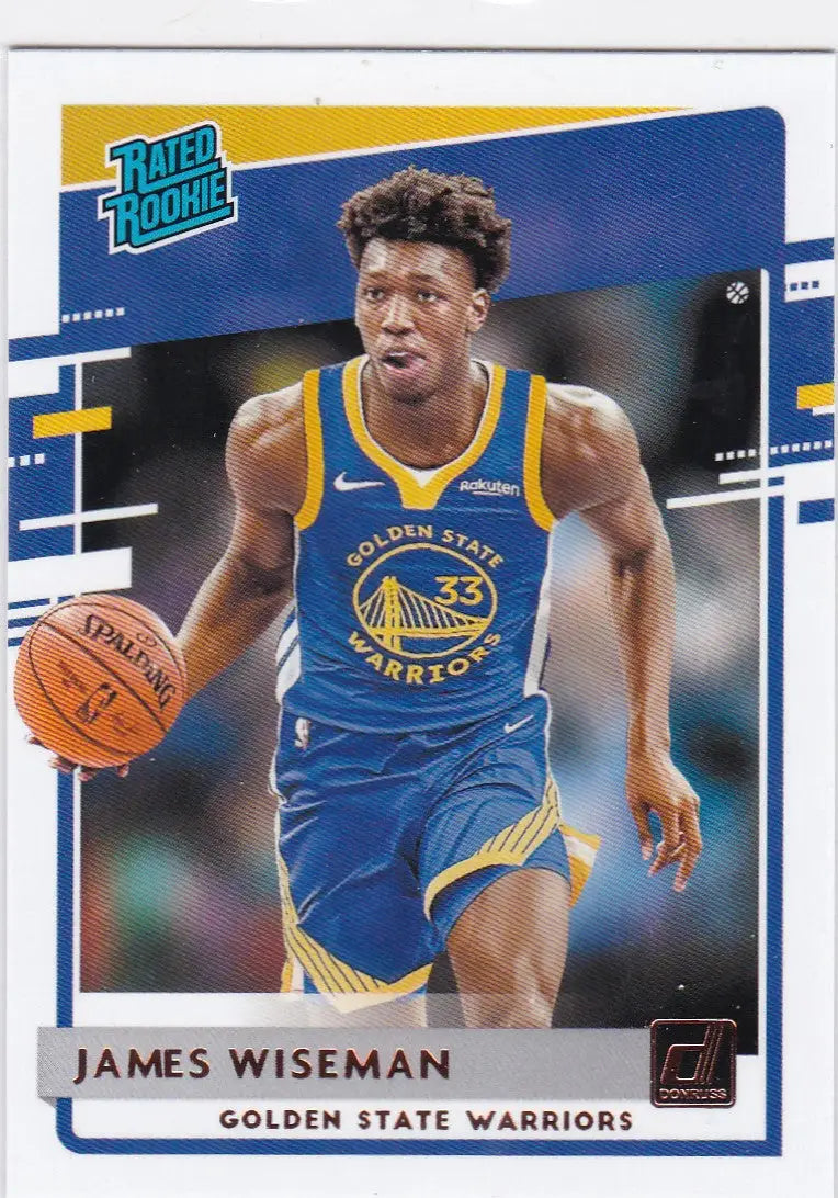 Basketball trading card of James Wiseman Golden State dribbling ball from Donruss Rated Rookie