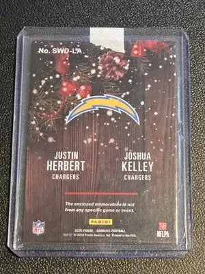 Justin Herbert and Joshua Kelley Chargers football card from 2020 Donruss Rookie Holiday Sweater series