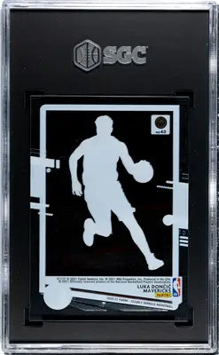 SGC-graded Donruss Luka Doncic basketball card with white silhouette on black background