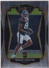 Football player in dark uniform with football, representing Isaiah Coulter RC Houston Texans