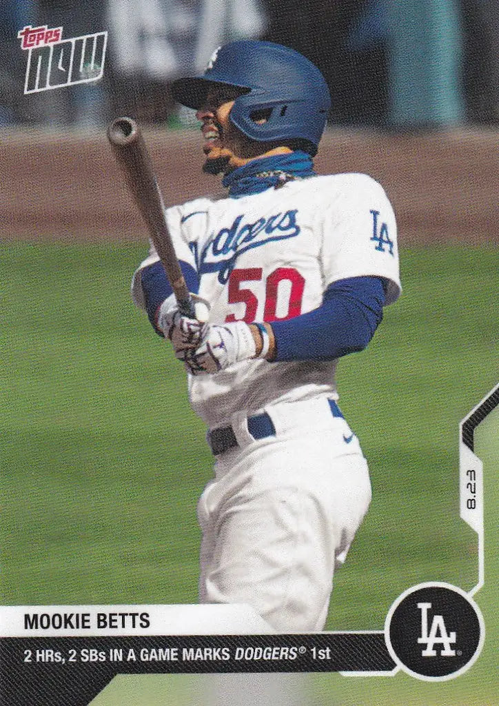 Baseball player Mookie Betts in Los Angeles Dodgers uniform swinging bat
