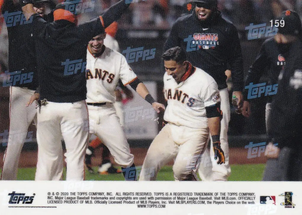 Baseball players celebrating Donovan Solano’s success with the San Francisco Giants