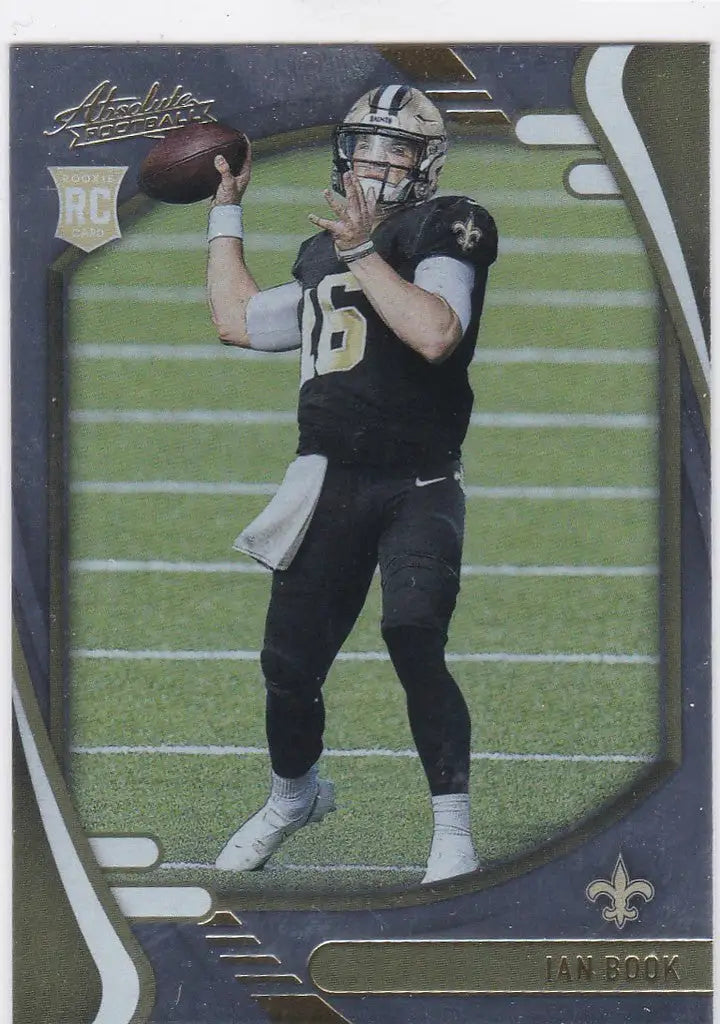 Ian Book in black Orleans Saints uniform ready to throw a pass on trading card