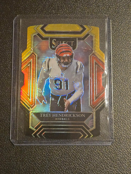 Trey Hendrickson football trading card in protective sleeve from 2021 Panini Select Black and Gold Prizm Die Cut