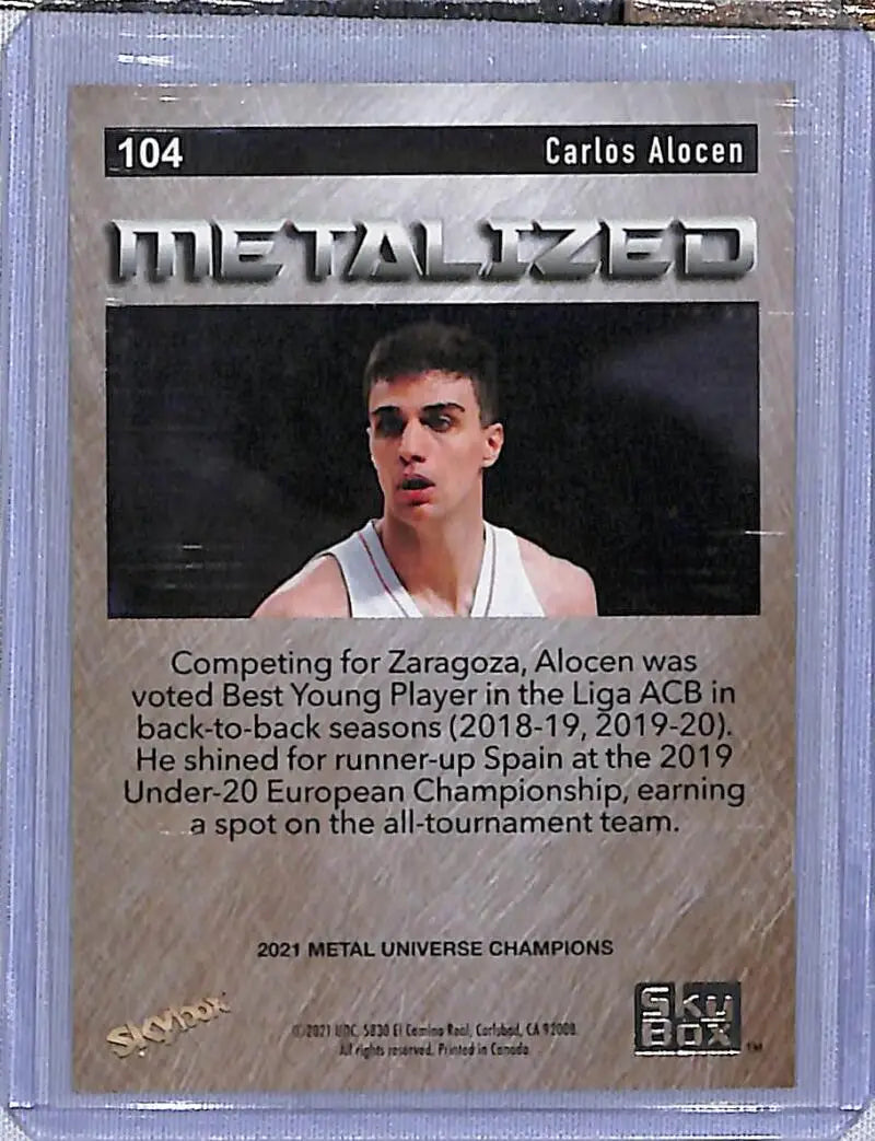 Basketball card of Carlos Alocen in white jersey from Metal Universe Champions collection