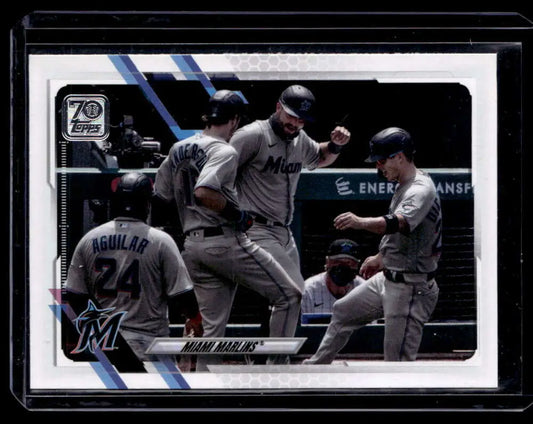 Miami Marlins players celebrating on 2021 Topps #172 Miami Marlins card