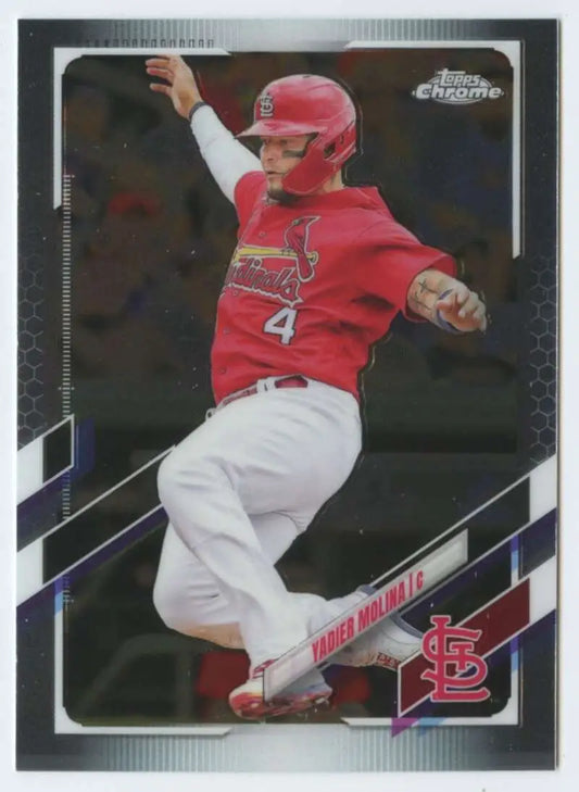 Yadier Molina swinging bat in red St. Louis Cardinals uniform baseball card image