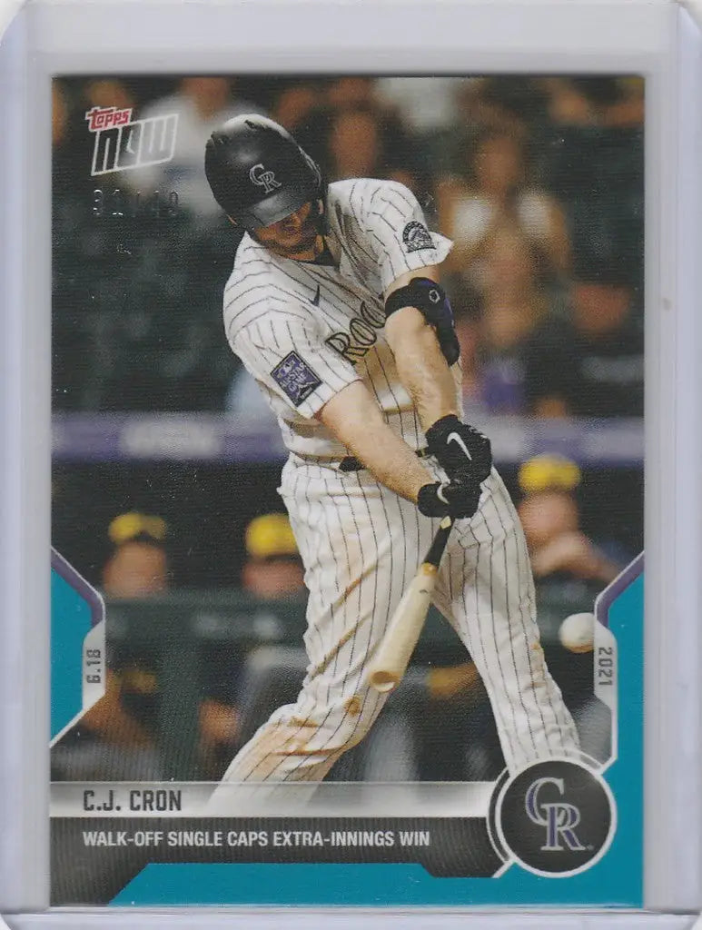 Baseball card of C.J. Cron swinging for the Colorado Rockies 31/49 collectible