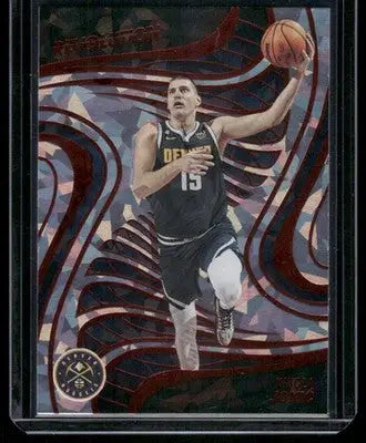 Basketball trading card of Nikola Jokic in black Denver Nuggets jersey from 2022-23 Panini Revolution