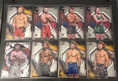UFC trading card lot featuring rookies, vets, Prizm, Refrac, and base cards
