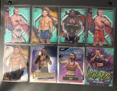 Collection of eight UFC trading card sets from 2022-24 including Rookies and Vets card lot