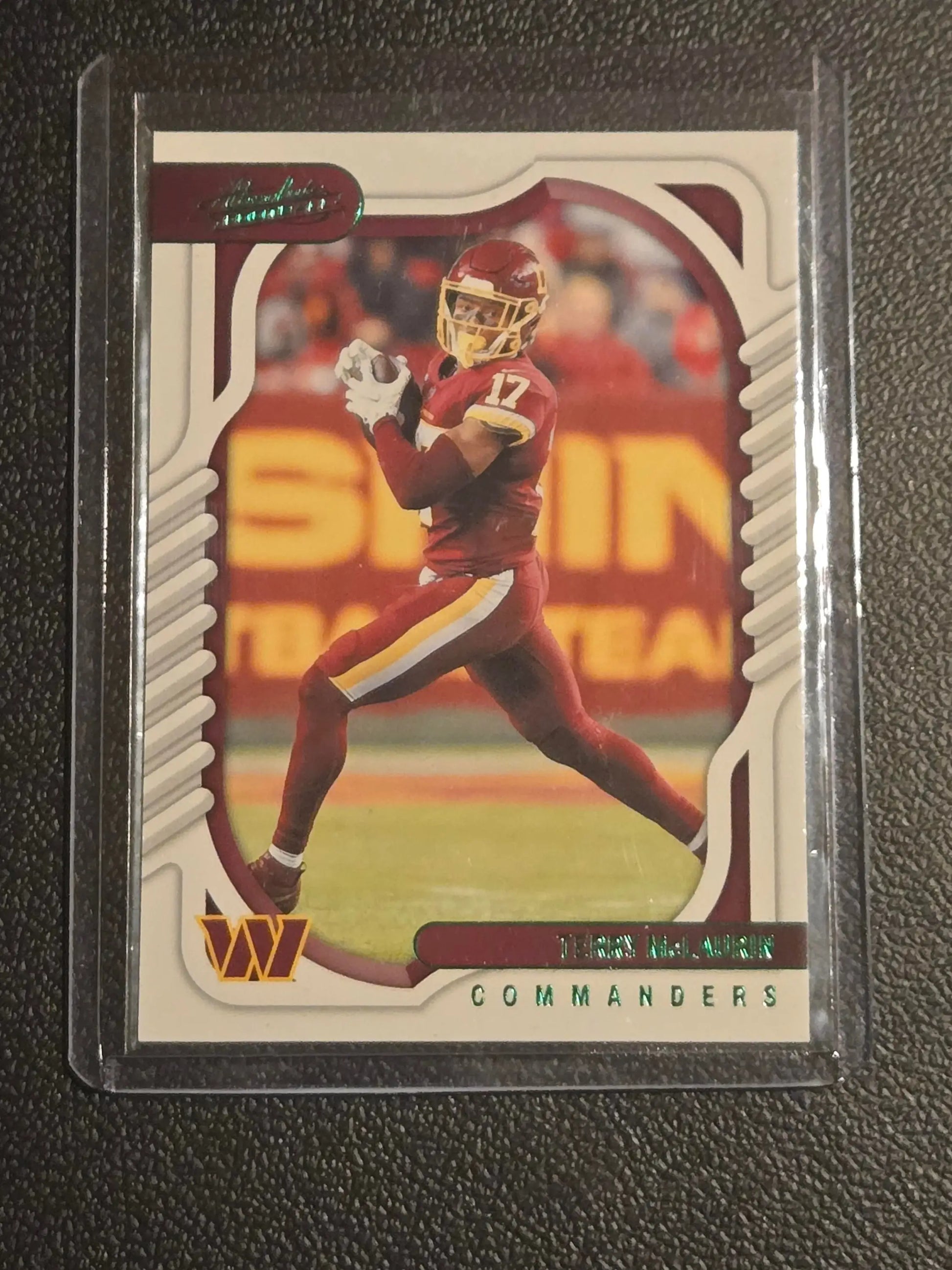 Football trading card featuring Terry McLaurin in maroon and gold uniform from Panini Absolute