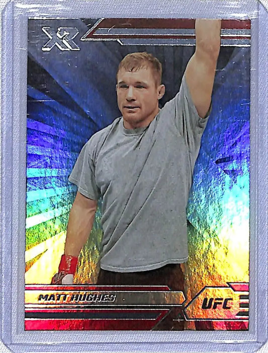 Holographic Panini Chronicles XR UFC card of Matt Hughes in gray t-shirt with raised arm