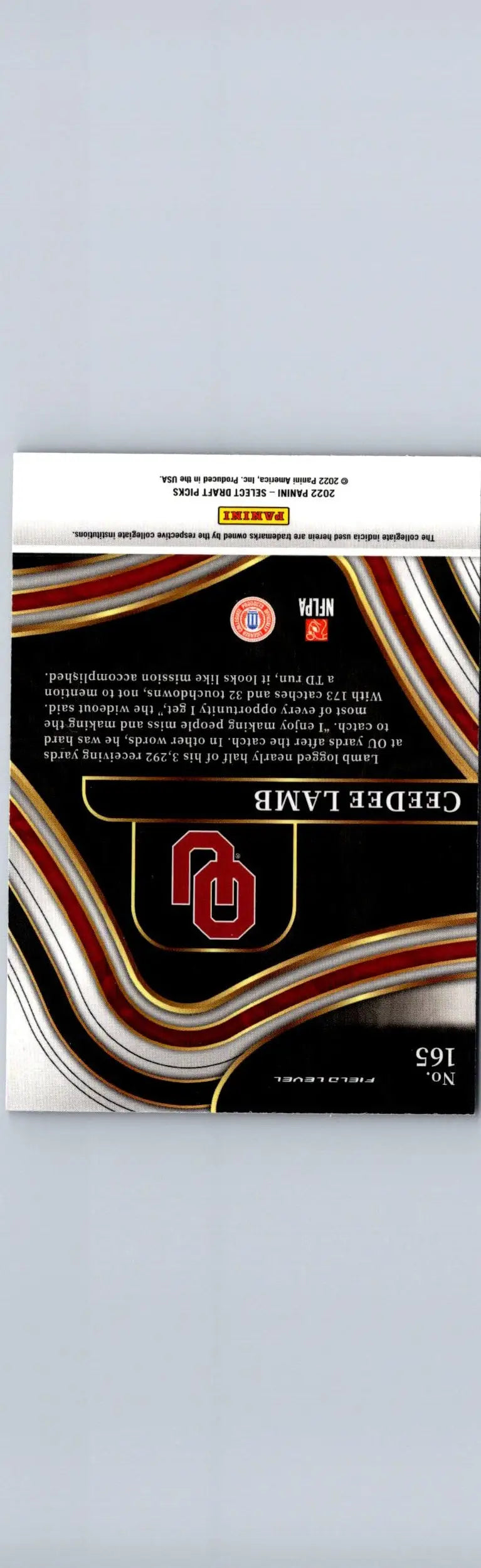 2022 Panini Select Draft Picks CeeDee Lamb football trading card with black red and gold design