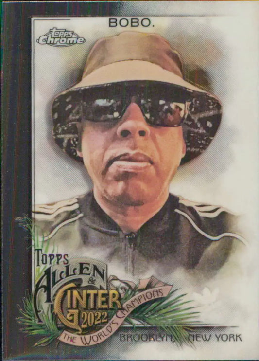 Trading card of Eric Bobo wearing sunglasses and a bucket hat from Topps Allen and Ginter