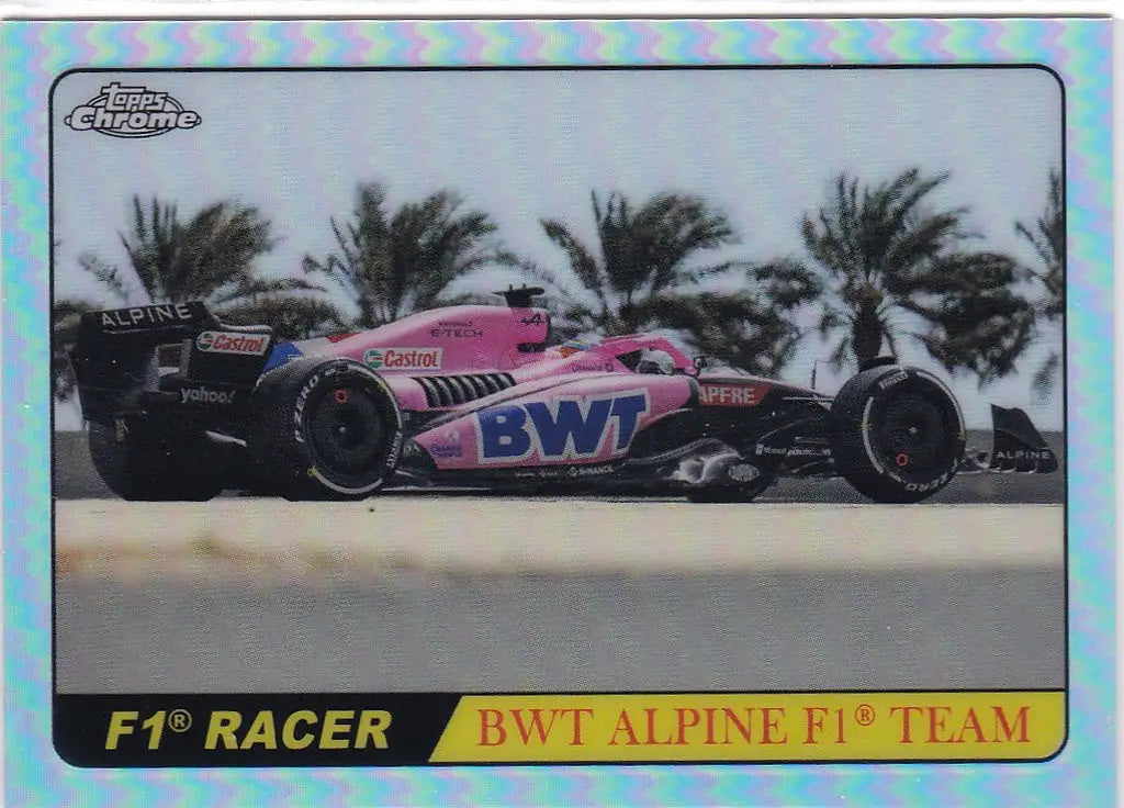 Pink and black Formula 1 racing car with BWT branding on Alonso insert card Alpine