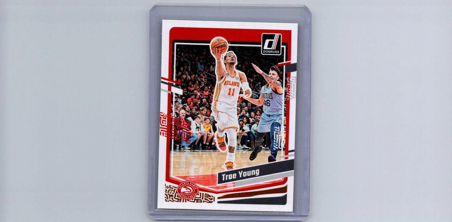 Trae Young basketball card featuring 2023-24 Donruss #15 Yellow Flood design