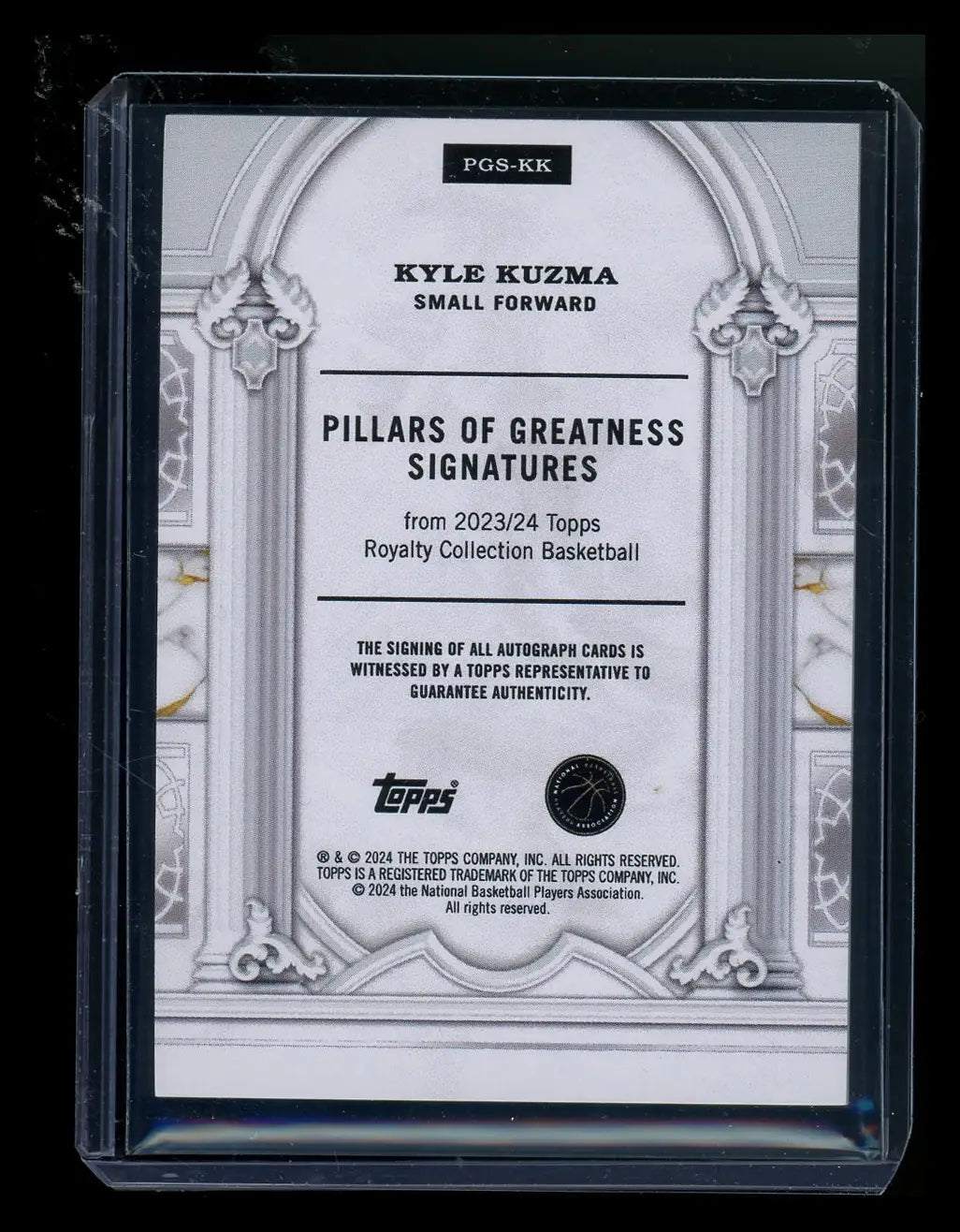 Back of Kyle Kuzma trading card in protective case from Topps Royalty Collection Basketball