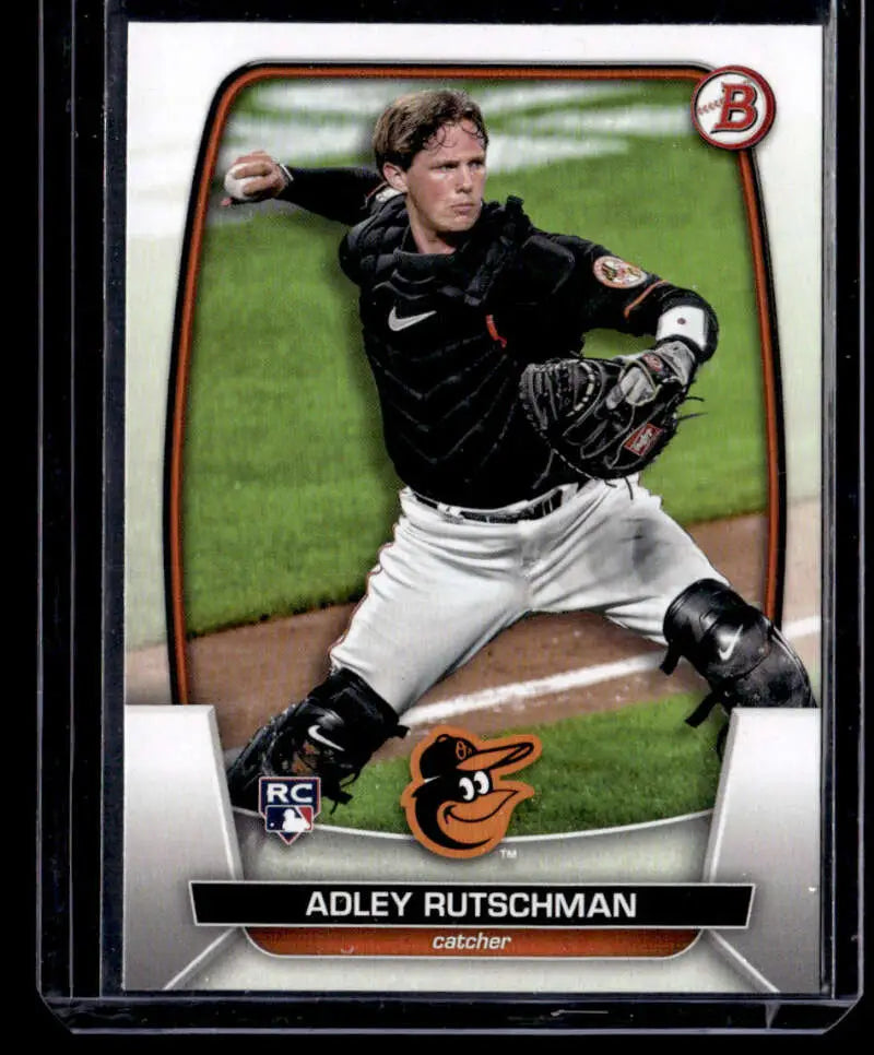 Baseball card of Adley Rutschman in throwing motion, showcasing Rutschman NM-MT quality