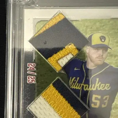 Baseball trading card featuring Brandon Woodruff and Topps Chrome Jersey Fusion patch