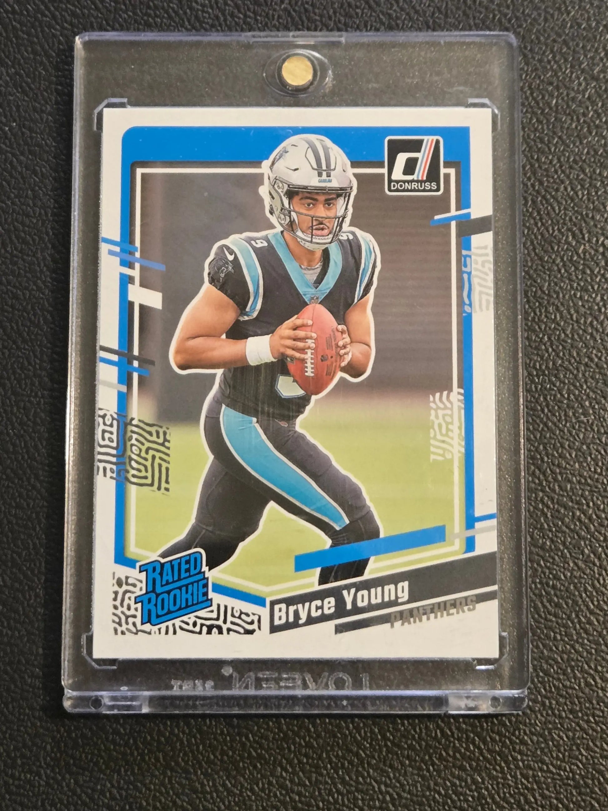 Bryce Young Rated Rookie football card in protective case from 2023 Donruss #311