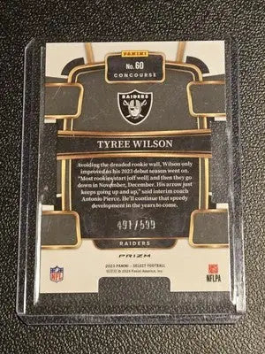 Tyree Wilson Neon Green Prizms Die Cuts football card from 2023 Panini Select