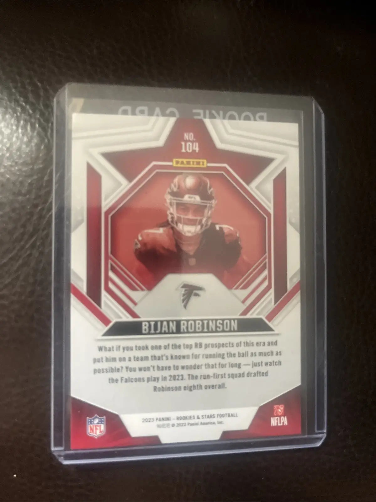 Bijan Robinson rookie trading card from 2023 Rookies and Stars, Atlanta Falcons #104