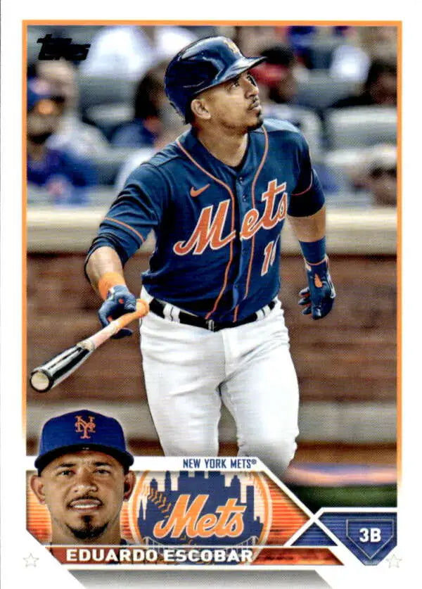 Baseball card of Eduardo Escobar in navy New York Mets jersey taking a swing