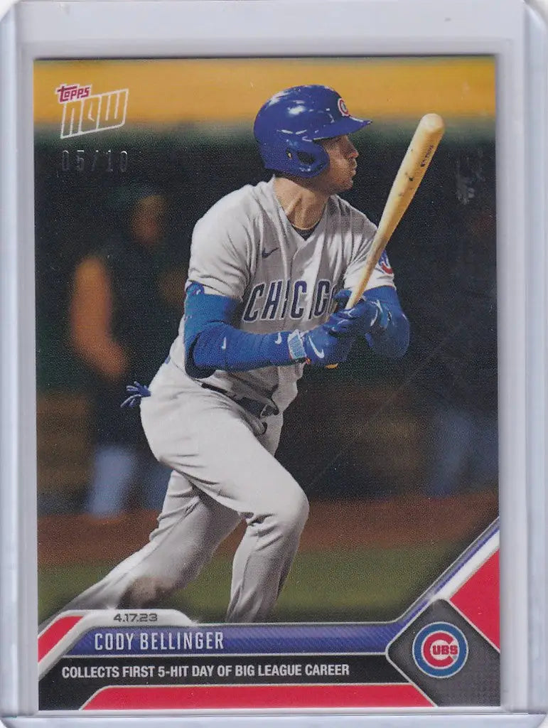 Baseball card of Cody Bellinger at bat for the Chicago Cubs in gray away uniform