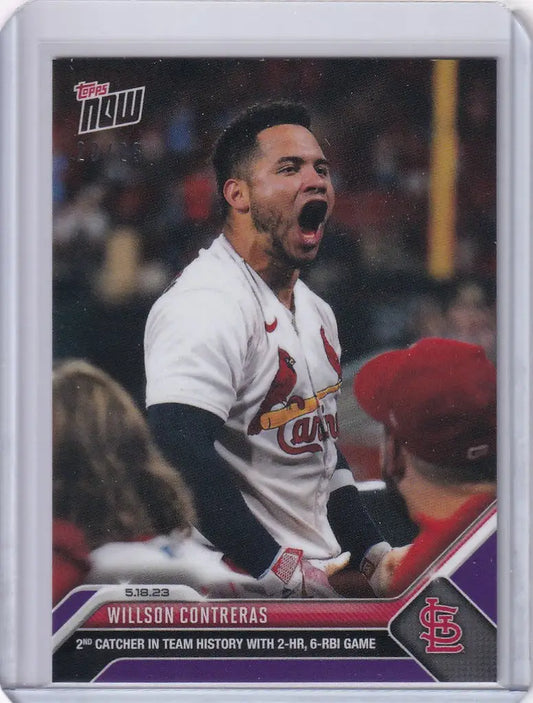 Baseball trading card of Willson Contreras celebrating with St. Louis Cardinals