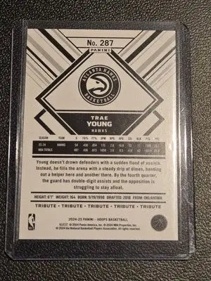 Trae Young basketball card from 2024-25 Hoops series featuring Trae Young player