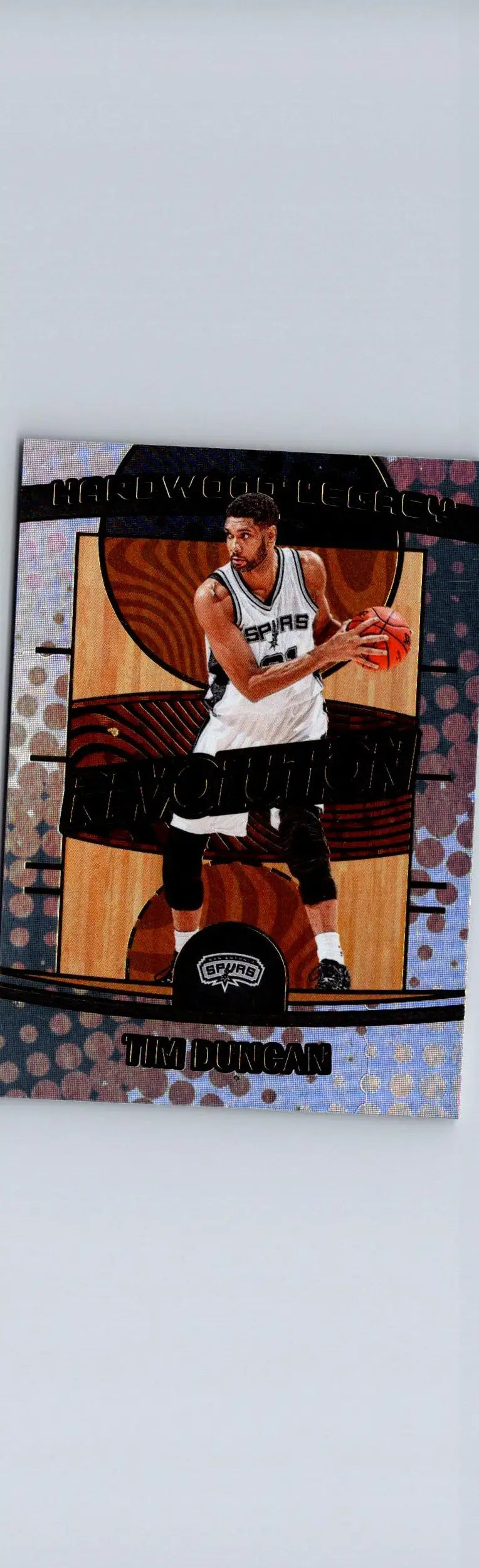 Collectible basketball trading card featuring Tim Duncan Hardwood Legacy from 2024-25 Panini Revolution