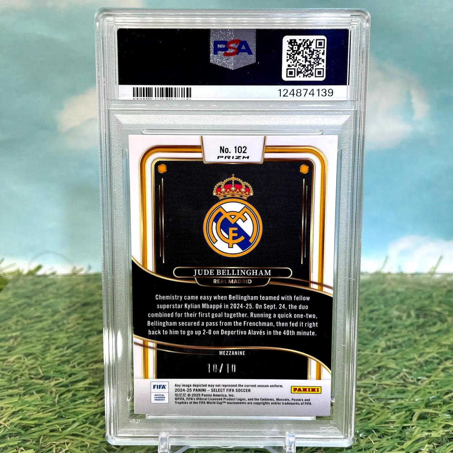 A graded Jude Bellingham Select FIFA trading card with Gold Mojo finish and PSA 9 grade