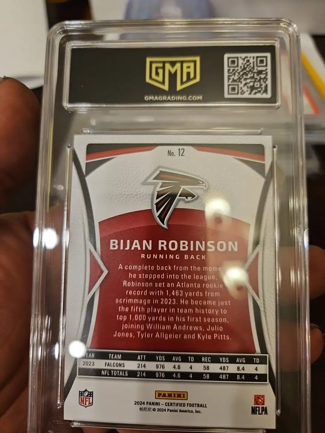 Graded Bijan Robinson football card from 2024 Certified with mirror red /100 Falcons