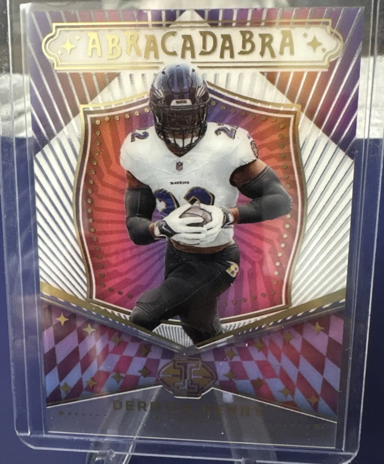 Football trading card featuring Derrick Henry in white jersey and purple helmet from Panini Illusions Derrick Henry Abracadabra series