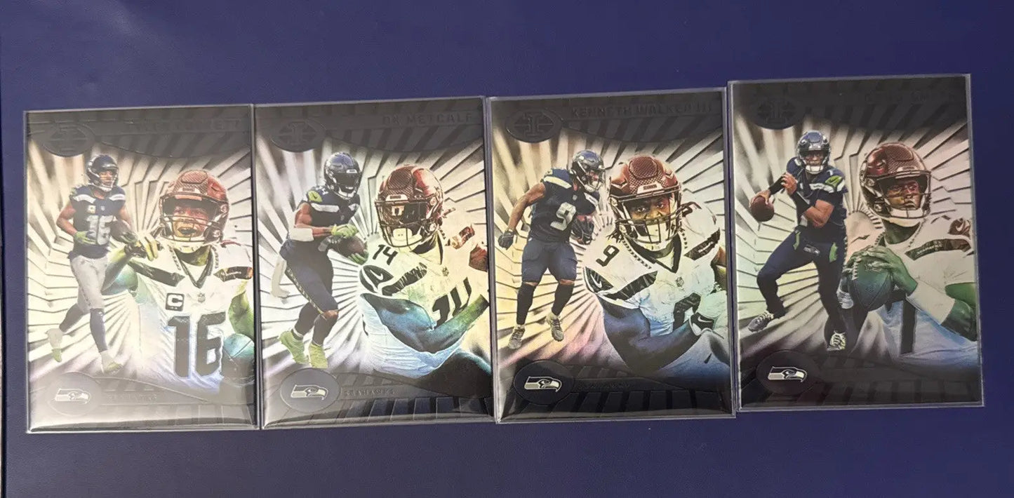 Four Seattle Seahawks football trading cards from 2024 Illusions Emerald Green series