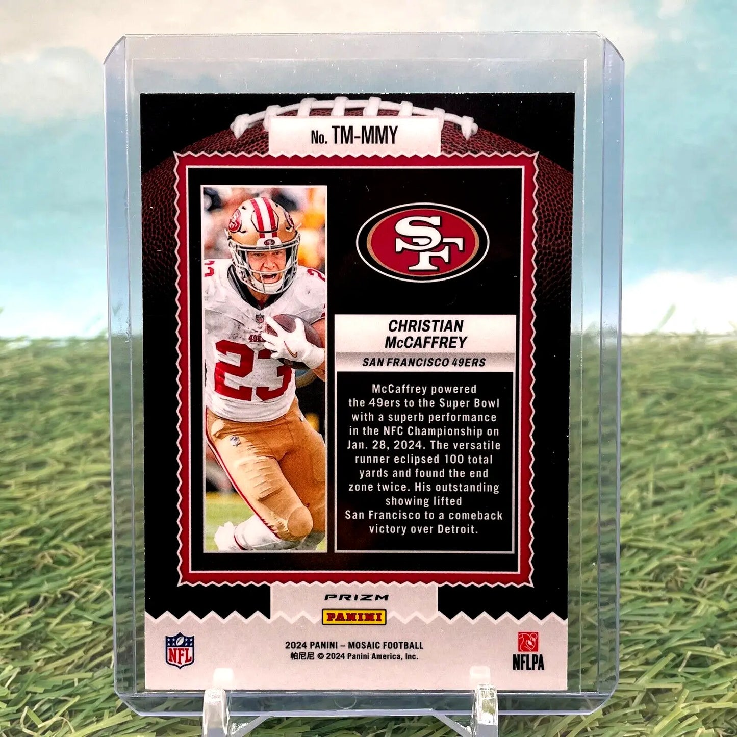 NFL trading card of Christian McCaffrey in red and gold uniform, Mosaic Prizm insert