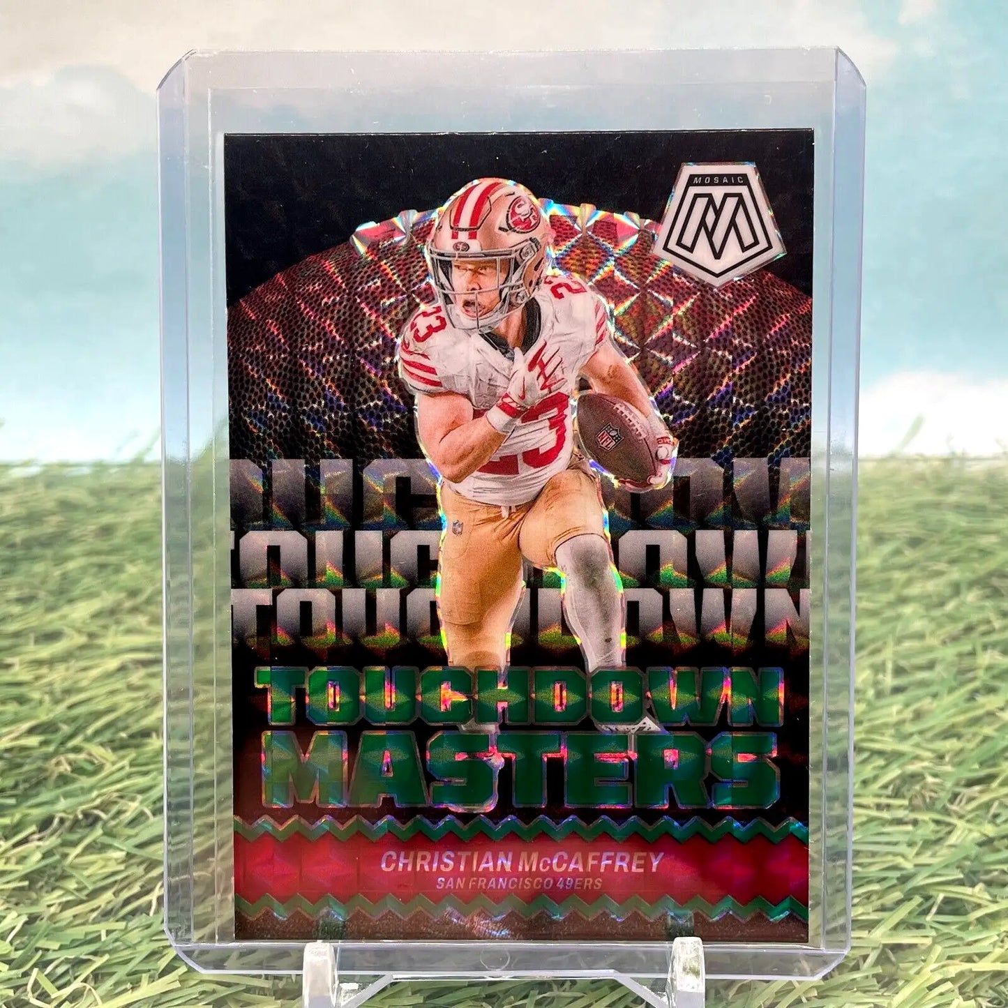 Football trading card of Christian McCaffrey in 49ers uniform from Mosaic Prizm series