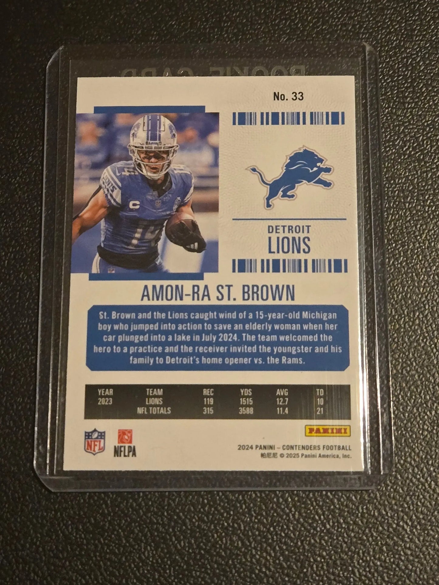 Football trading card of Amon-Ra St. Brown from Panini Contenders 2024 Game Ticket Red