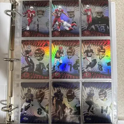 Binder of nine Panini Illusions trading cards from the 2024 Complete Base Set