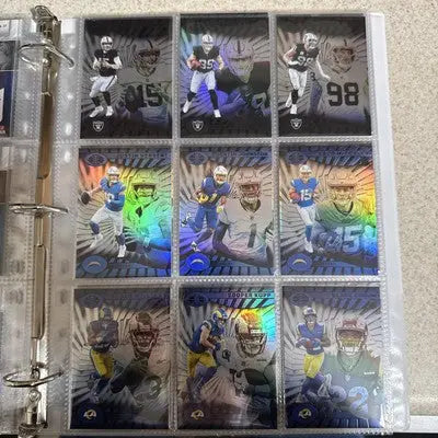 Panini Illusions trading cards base set featuring Raiders, Chargers, and Rams players