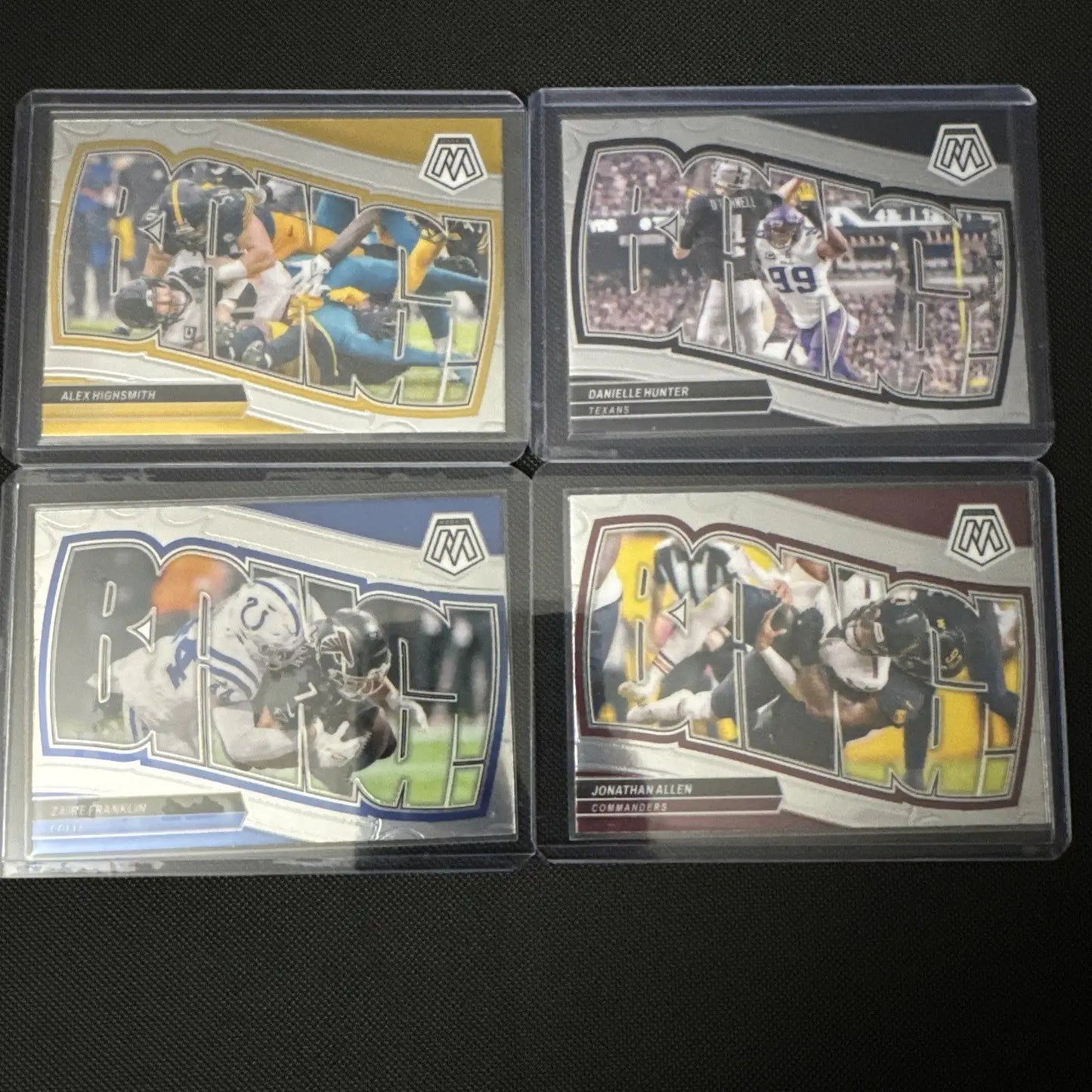 Four football trading cards from the 2024 Panini Mosaic Football Bang complete set